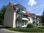 Hausansicht hinten - 2 Zimmererdgeschosswohnung mit Balkon in Baukau-West